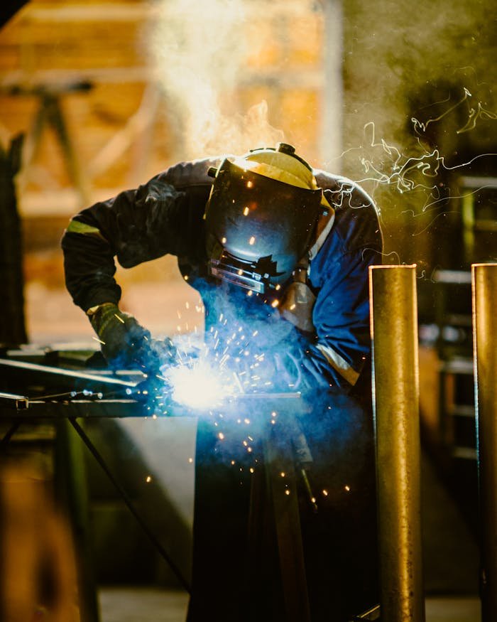 Skilled trades welder working in an industrial workshop, representing KeyWest Resources industrial and technical recruitment services across Western Australia and Queensland.